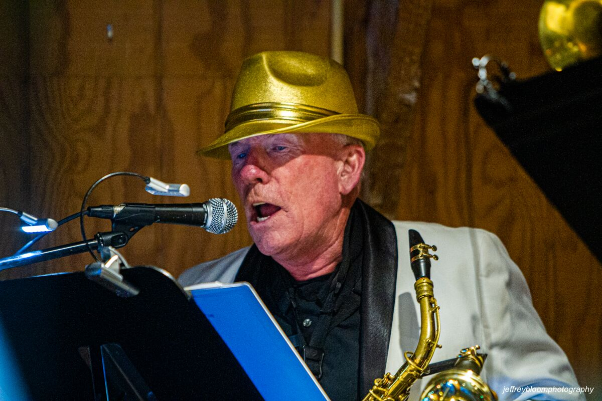 Male vocalist singing passionately